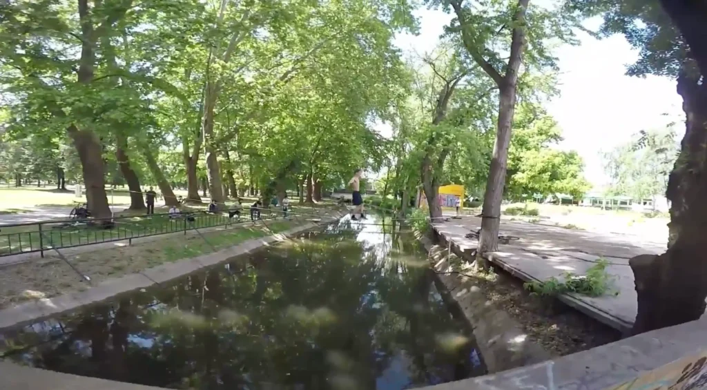 Build confidence for slackline crossing a canal